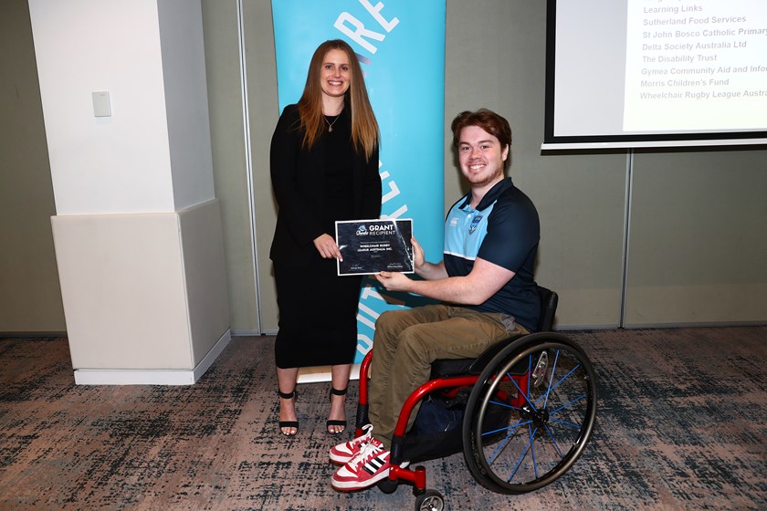 Liam Luff accepted the Sharks ClubGRANTS on behalf of Wheelchair Rugby League Australia