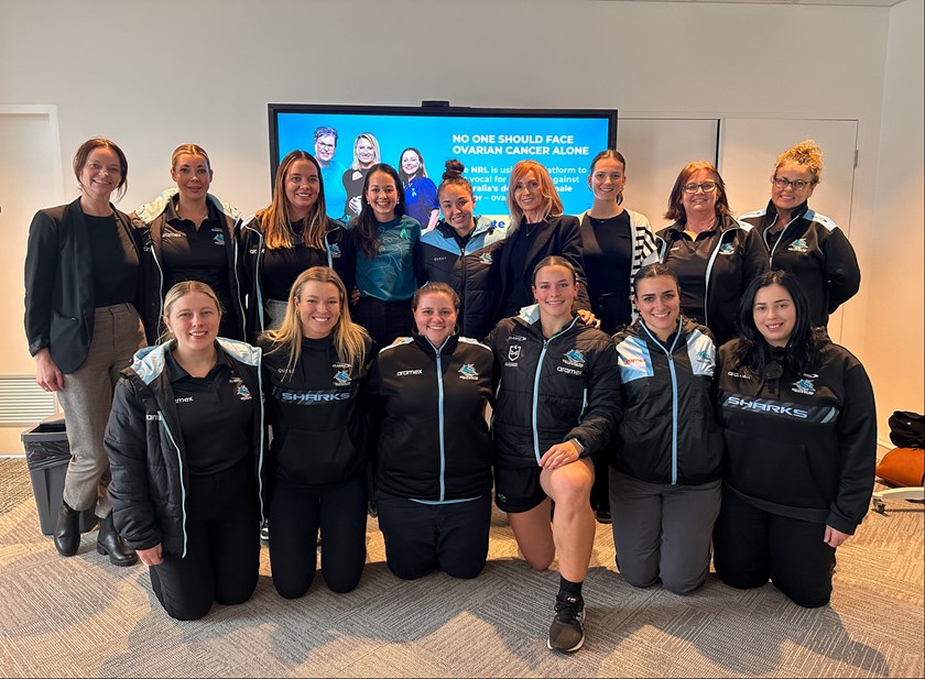 Sharks staff after a talk from Ovarian Cancer Australia.