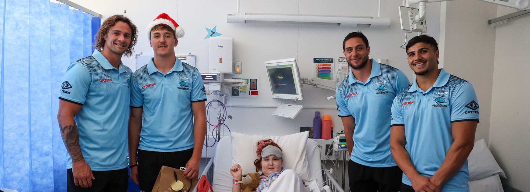 Sharks spread Christmas cheer in community blitz